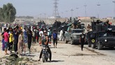 Tiga pekan pasca referendum kemerdekaan, warga Kurdistan justru kehilangan wilayah kekuasaan mereka di Kirkuk. Pada Senin (16/10), pasukan pemerintah Irak merebut kota minyak besar itu. (AFP Photo/Ahmad Al-Rubaye)