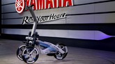 Yamaha TRITOWN merupakan kendaraan listrik kompak roda tiga untuk mendukung konektivitas antar fitur. Dengan dimensi 1.100x600x1.130 mm, kendaraan ini bisa untuk mobilitas jarak pendek. (REUTERS/Toru Hanai)