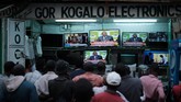 Presiden petahanan Kenya resmi dinyatakan memenangkan pemilu ulang yang sempat diboykot oposisi dan diwarnai friksi akibat protes pihak oposisi, Senin (30/1). (AFP Photo/Yasuyoshi Chiba)
