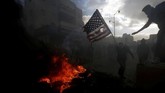 Protes pecah di sejumlah wilayah Palestina pada Kamis (7/12) menyusul keputusan Amerika Serikat mengakui Yerusalem sebagai ibu kota Israel. (REUTERS/Mohamad Torokman)