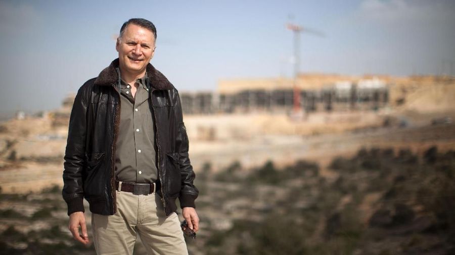 RAWABI, WEST BANK - FEBRUARY 08:  Bashar Masri, the Palestinian-American developer of Rawabi, visits the site on February 8, 2012 in Rawabi, West Bank. The planned Palestinian city, with the first stage expected to be finished in two years, will have six neighborhoods and a population of 40,000.  (Photo by Uriel Sinai/Getty Images)