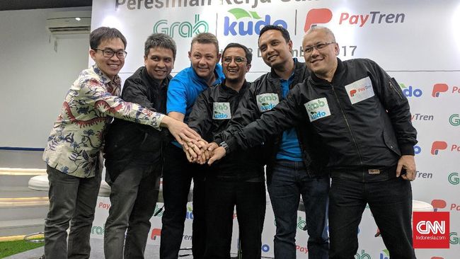 Menakar Buah Kerja Sama Grab - PayTren