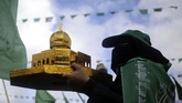 Warga Palestina menginginkan Yerusalem Timur sebagai ibu kotanya jika kelak mendapatkan kemerdekaan penuh. Sementara itu, Israel menganggap kota tersebut sebagai ibu kota abadinya sejak pertama kali didirikan. (AFP PHOTO/Mohammed Abed)