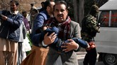 Setidaknya sembilan tewas dan 56 luka-luka ketika dua pelaku bom bunuh diri menyerang sebuah gereja metodis di Quetta, Pakistan, pada Minggu (17/8). (REUTERS/Naseer Ahmed)