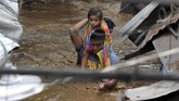Empat tahun lalu Topan Haiyan yang menghempas Filipina menimbulkan korban hilang dan tewas sebanyak 6.350 orang. (AFP PHOTO / Josep DEVEZA)