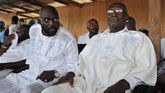 Pada 2011, George Weah menjadi calon Wakil Presiden Liberia berpasangan dengan Winston Tubman (kanan). Weah dan Tubman kemudian kalah dari calon petahana Ellen Johnson Sirleaf. (AFP PHOTO / ISSOUF SANOGO)