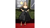 Sarah Jessica Parker hampir tak pernah gagal saat tampil di karpet merah. Kali ini, ia mengenakan gaun cocktail Dolce & Gabbana dengan detil satin dan tulle. (Frazer Harrison/Getty Images/AFP)