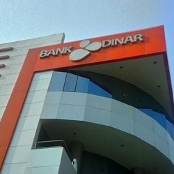 OJK Belum Terbitkan Izin Merger Bank Dinar, Kenapa?
