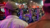 Namun, ambulans dan tim medis tak kunjung tiba, padahal pantai itu adalah salah satu daya tarik bagi turis di daerah tersebut. (Reuters/Lucas Landau)