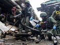 FOTO: Kerangka Motor Sisa Bom di Pasar Thailand