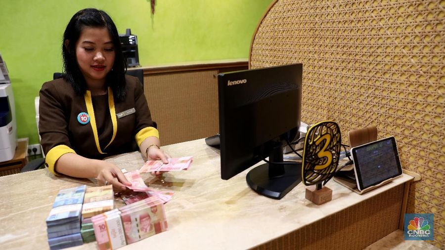 Aktifitas suasana pegawai Bank BTPN di kantor pusat Menara BTPN, Jakarta, Rabu (31/1/2018). PT Bank Tabungan Pensiun Tbk (BTPN) dan PT Bank Sumitomo Mitsui Indonesia (SMBCI) akan segera merger. Dampak dari merger ini tidak akan merubah komposisi pemegang saham.