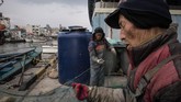 Kabur setelah perang Korea puluhan tahun silam, generasi tua dari para pengungsi di Desa Abai itu masih memiliki ikatan batin kuat dengan Korut. (AFP Photo/Ed Jones)