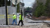 Saat itu, menurut NTSB, insinyur Amtrak mengatakan dia salah membaca sinyal dan mencoba mengerem sebelum kecelakan terjadi (AFP PHOTO/Logan Cyrus)