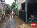 Banjir Surut, Warga Sibuk Berjibaku Bersihkan Lumpur
