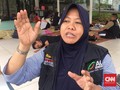 Perjuangan Nuryani, Ibu Rumah Tangga Relawan Banjir Jakarta