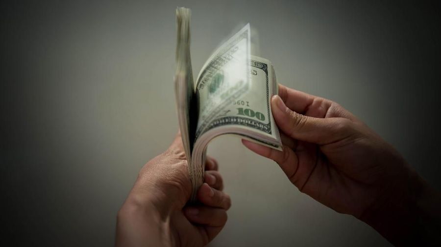 Many bundles of US dollars bank notes