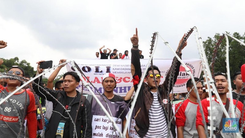 Driver taksi online kembali berdemo menolak Peraturan Menteri Perhubungan Nomor 108 Tahun 2017.