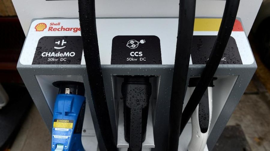 FILE PHOTO: Electric car chargers are seen at the Holloway Road Shell station where Shell is launching its first fast electric vehicle charging station in London, Britain October 18, 2017. REUTERS/Mary Turner/File Photo