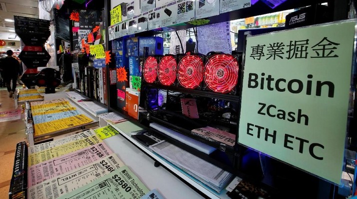 A cryptocurrency mining computer equipped with four cooling fans is seen on display at a computer mall in Hong Kong, China January 29, 2018. Picture taken January 29, 2018. REUTERS/Bobby Yip
