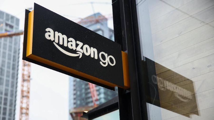 A sign for the new Amazon Go store on 7th Avenue at Amazon's Seattle headquarters in Seattle, Washington, U.S., January 29, 2018. REUTERS/Lindsey Wasson