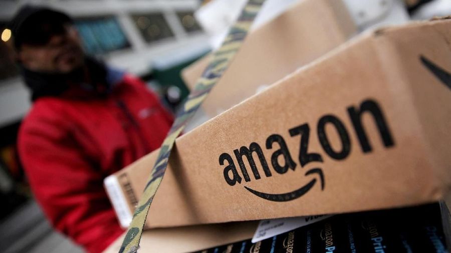 FILE PHOTO: Amazon boxes are seen stacked for delivery in Manhattan, New York, U.S., January 29, 2016. REUTERS/Mike Segar/File Photo