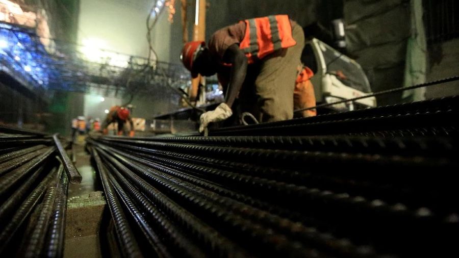 Contractors assemble steel for the construction of Karuma 600 megawatts hydroelectric power project under construction on River Nile, Uganda February 20, 2018. Picture taken February 20, 2018. REUTERS/James Akena