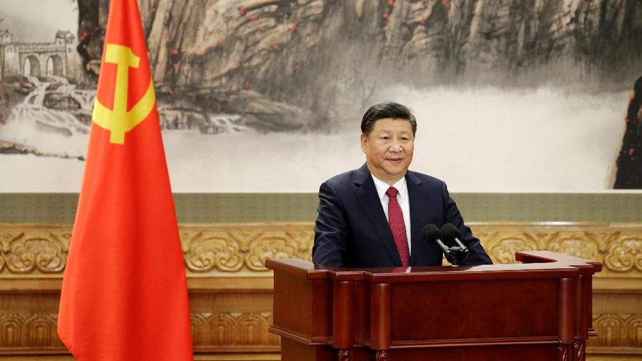 FILE PHOTO: Chinese President Xi Jinping speaks as China's new Politburo Standing Committee members meet with the press at the Great Hall of the People in Beijing, China October 25, 2017. REUTERS/Jason Lee/File Photo