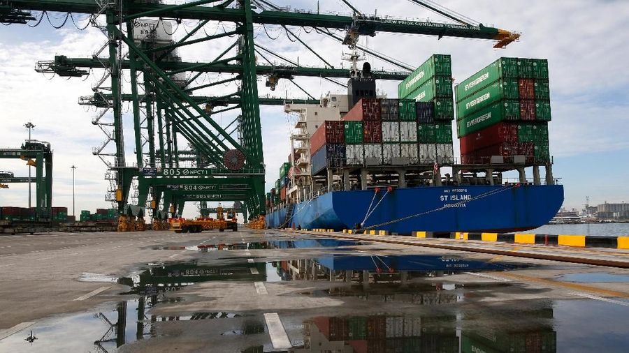 FILE PHOTO: A ship is unloaded at New Priok Container Terminal One in Tanjung Priok, north Jakarta, Indonesia November 16, 2016. REUTERS/Darren Whiteside/File Photo GLOBAL BUSINESS WEEK AHEAD