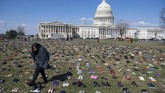 Sementara itu, pihak penyelenggara menyatakan aksi ini merupakan momen penting dalam gerakan menghentikan kekerasan dengan senjata. (AFP Photo/Saul Loeb)