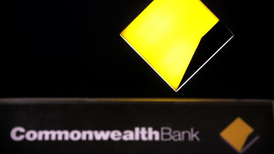 FILE PHOTO: A Commonwealth Bank logo adorns an Automatic Tellar Machine (ATM) located in Sydney, Australia November 12, 2014.  REUTERS/David Gray/File Photo