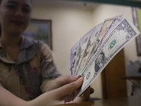 Rupiah Tergilas 1% Terhadap Dolar AS pada Kuartal I 2018