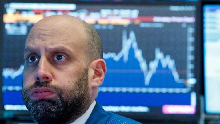 Stock Exchange, (NYSE) Specialist trader Meric Greenbaum works at his post on the floor of the New York Stock Exchange, (NYSE) in New York, U.S., March 22, 2018. REUTERS/Brendan McDermid