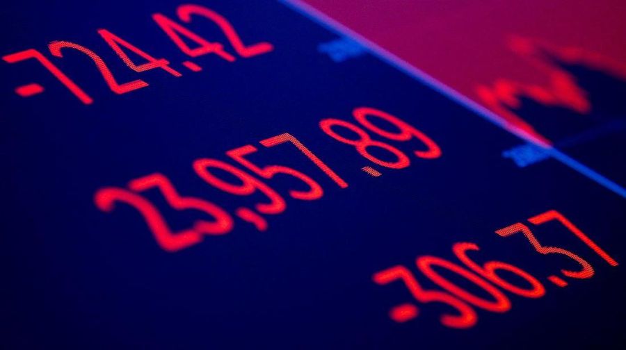 The Dow Jones Industrial Average is displayed on a screen after the closing bell, over the floor of the New York Stock Exchange, (NYSE) in New York, U.S., March 22, 2018. REUTERS/Brendan McDermid