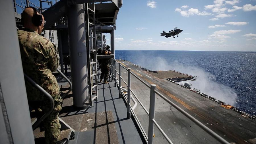 A Marine Corps pilot prepares for a vertical landing of Lockheed Martin F-35B stealth fighter aboard the USS Wasp amphibious assault carrier during their operation in the waters off Japan's southernmost island of Okinawa March 23, 2018. REUTERS/Issei Kato