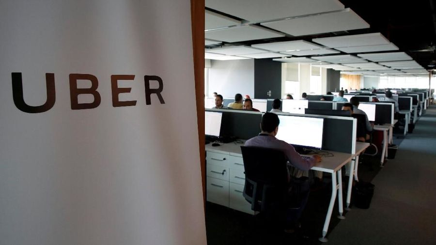 FILE PHOTO: Employees work inside Uber's Centre of Excellence office in Cairo, Egypt October 10, 2017. REUTERS/Amr Abdallah Dalsh/File Photo