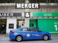 Kesepakatan Grab-Uber Hadapi Berbagai Hambatan