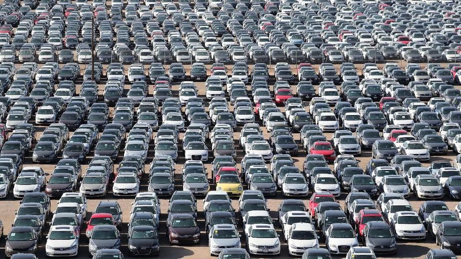 Reacquired Volkswagen and Audi diesel cars sit in a desert graveyard near Victorville, California, U.S. March 28, 2018. Volkswagen AG has paid more than $7.4 billion to buy back about 350,000 vehicles, the automaker said in a recent court filing, and is now storing thousands of vehicles around the United States. Picture taken March 28, 2018. REUTERS/Lucy Nicholson