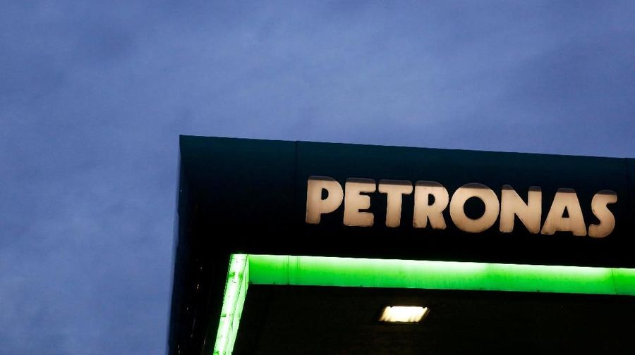 FILE PHOTO: A logo of a Petronas fuel station is seen against a darkening sky in Kuala Lumpur, Malaysia February 10, 2016. REUTERS/Olivia Harris/File Photo