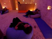 A group sits in the salt cave before a meditation session in Amman, Jordan, March 28, 2018. Picture taken March 28, 2018. REUTERS/Muhammad Hamed