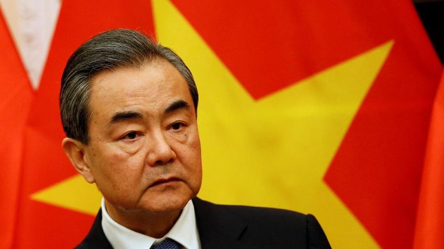 China's State Councilor and Foreign Minister Wang Yi  attends a news conference after a meeting with Vietnam's Deputy Prime Minister and Foreign Minister Pham Binh Minh (not pictured) at the Government Guesthouse in Hanoi, Vietnam April 1, 2018. REUTERS/Kham