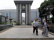 FILE PHOTO: People walk in the courtyard of Indonesia's central bank, Bank Indonesia, in Jakarta, Indonesia September 22, 2016.REUTERS/Iqro Rinaldi/File Photo