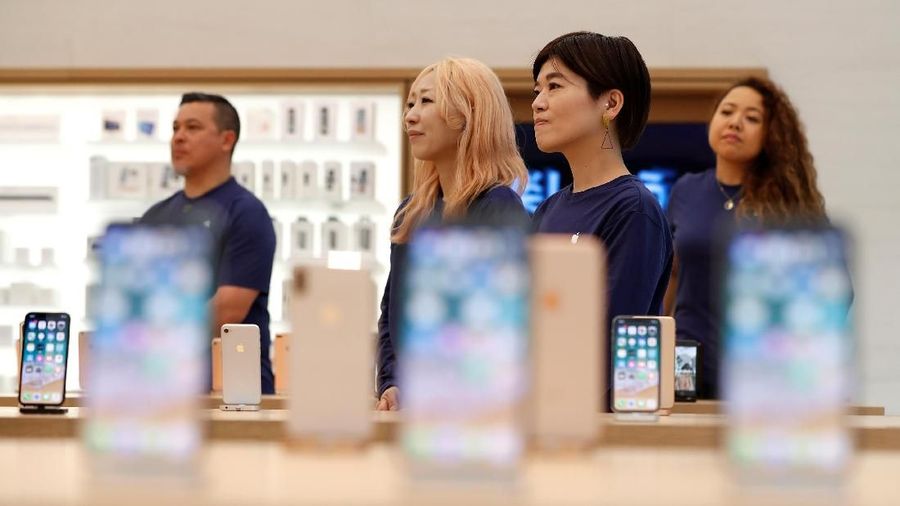 iPhone cases are displayed on a wall at the Apple Shinjuku store during a press preview ahead of it's grand open in Tokyo, Japan April 5, 2018. REUTERS/Issei Kato
