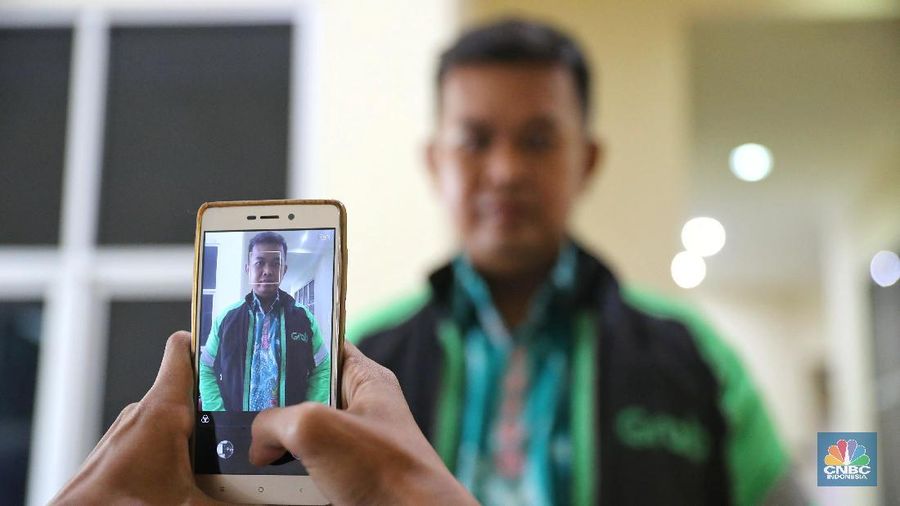 Driver ojek online mendorong adanya revisi UU Lalu Lintas dan Angkutan Jalan.