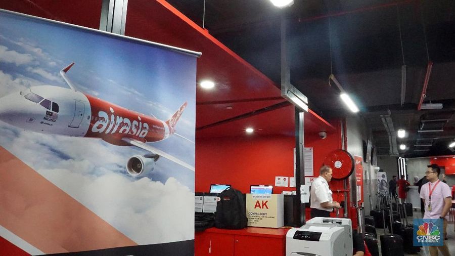 Dengan uang digital, AirAsia bisa mengurangi biaya perusahaan yag menerbangkan 89 juta penumpang dari berbagai negara dengan mata uang berbeda-beda.