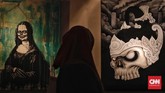 Bob dan Mike dari komunitas Marjinal menghadirkan semangat perlawanan kaum marjinal dan potret permasalahan sosial dalam karya-karya mereka. (dok. CNN Indonesia/Adhi Wicaksono)