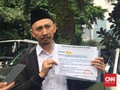 Diperiksa Soal Rocky Gerung, Abu Janda Bawa Salinan Kamus