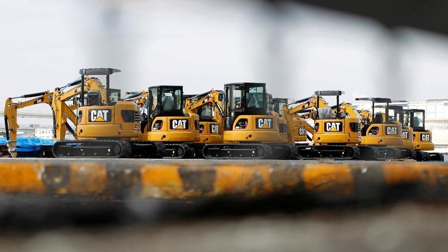 FILE PHOTO: New excavators are seen at a port in Yokohama, south of Tokyo February 10, 2011.  REUTERS/Toru Hanai