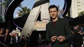 Tom Holland yang sukses membawakan karakter Spider-Man muda, punya penggemarnya sendiri. Meski baru terlibat di tiga film Marvel, ia sudah identik dengan Peter Parker. (REUTERS/Mario Anzuoni)