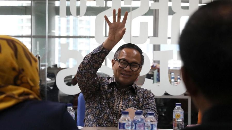 Bank Mandiri tidak langsung menaikkan bunga kredit ketika bunga acuan naik sehingga menekan margin bunga bersih (NIM)