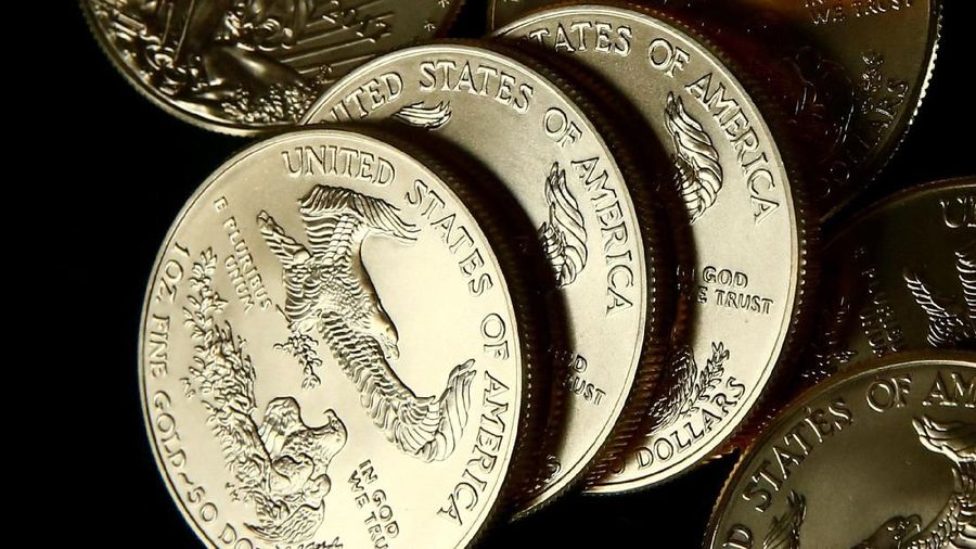 FILE PHOTO: Gold U.S. dollar bullion coins are seen in this photo illustration taken in Moscow, Russia, August 4, 2017. REUTERS/Maxim Shemetov
